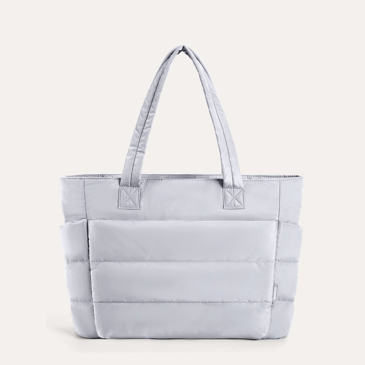 Lavender quilted tote bag with padded design and shoulder straps