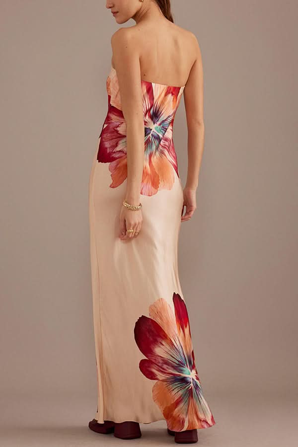 Back view of strapless satin maxi dress with red and peach floral design