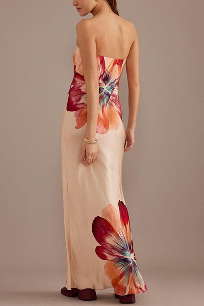 Back view of strapless satin maxi dress with red and peach floral design