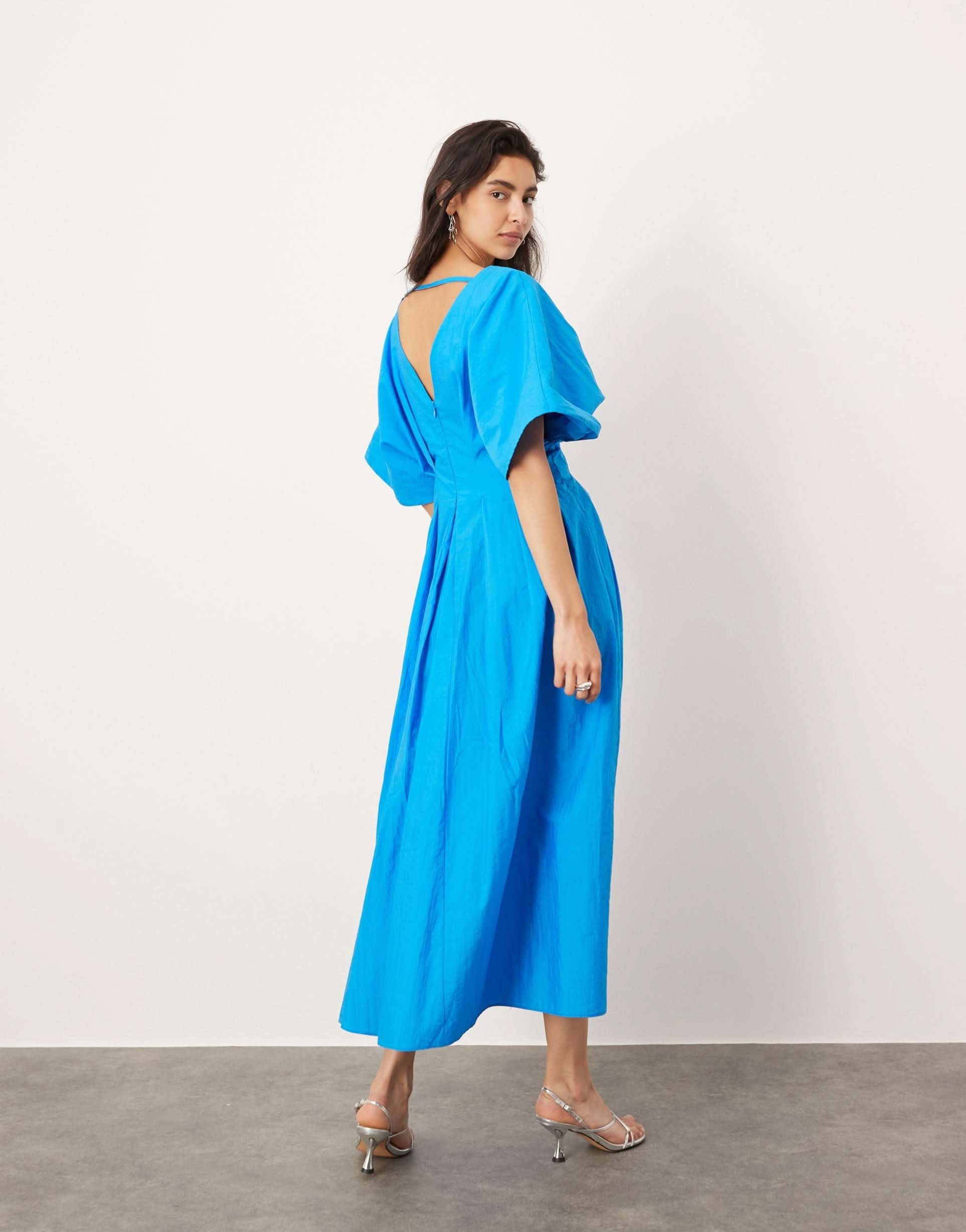 Blue V-neck wrap midi dress back view showing open back design for women