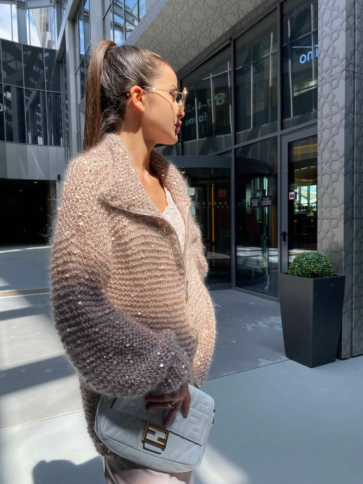 Beige sequin cardigan with wide collar and chunky knit construction