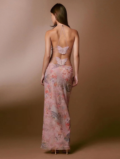 Open strappy back detail of butterfly maxi dress with decorative appliqué for women