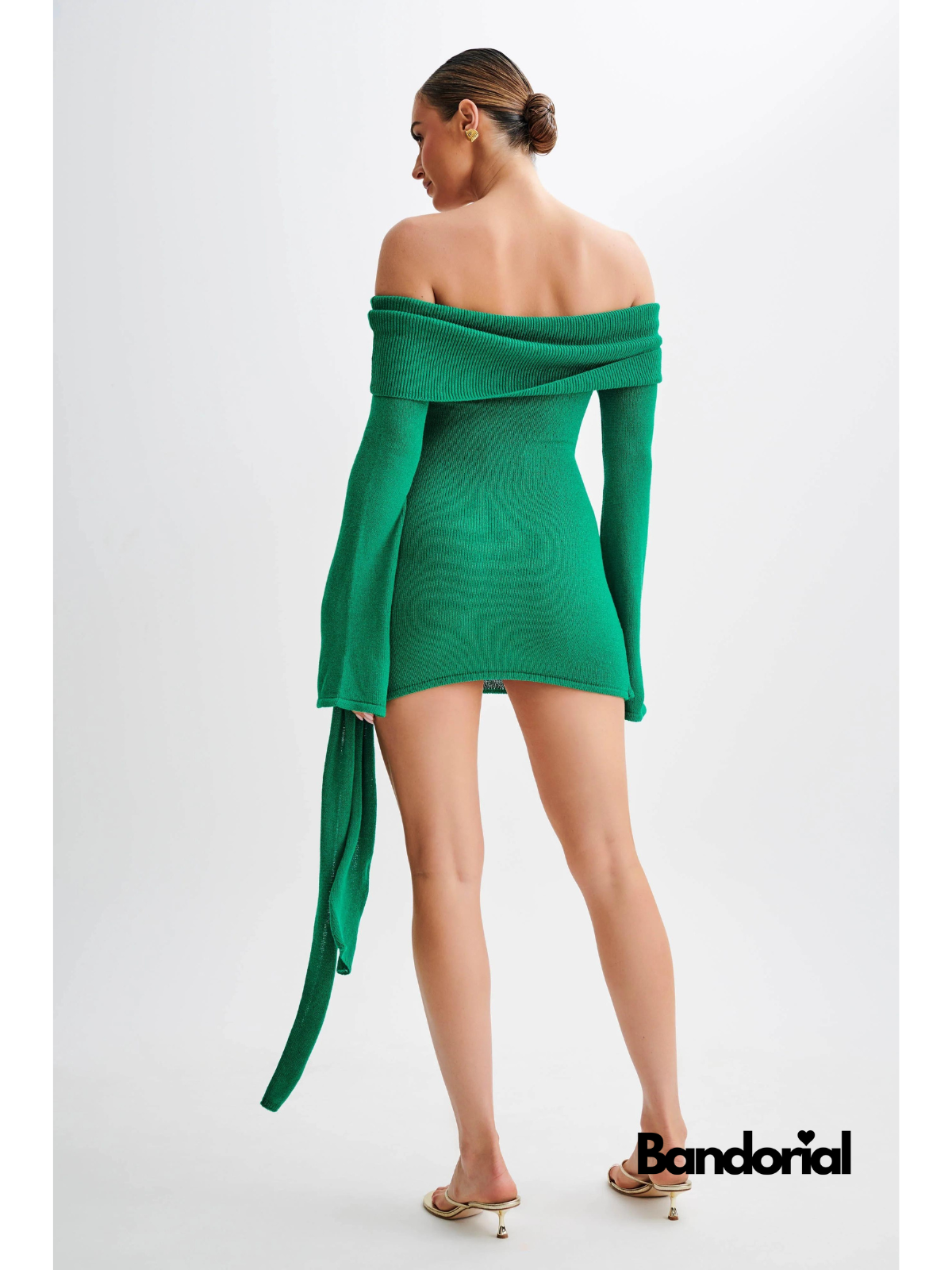 Emerald green ribbed off-shoulder mini dress with long flared sleeves and tie