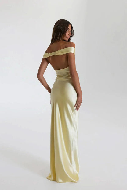 Back view of pale yellow satin maxi dress with open back detail