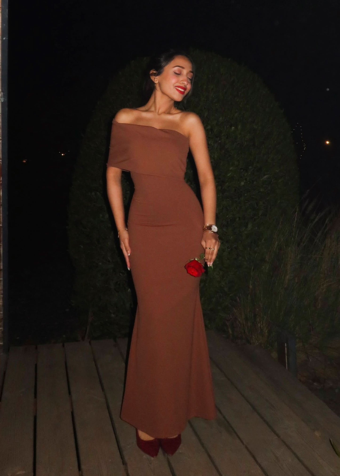 Caramel one-shoulder evening gown with elegant draping detail