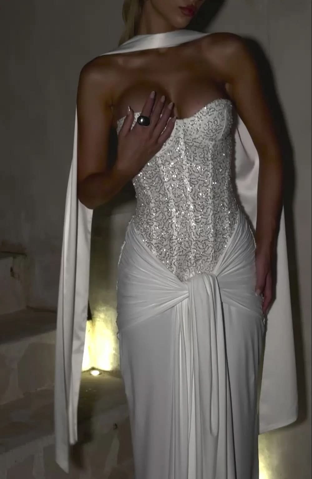 Silver sequin strapless maxi dress with draped cape and side slit