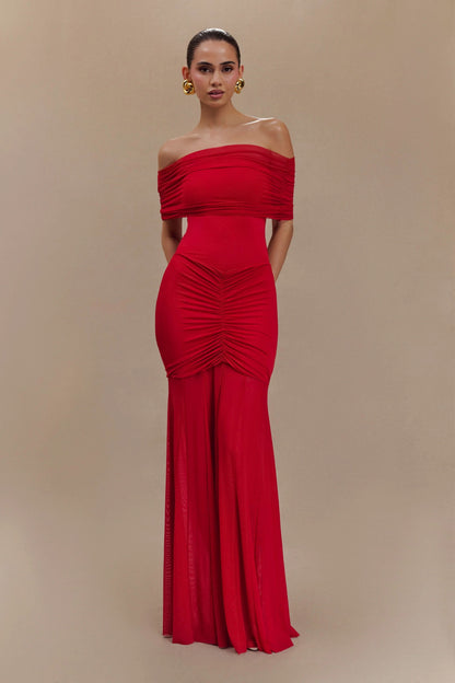 Red off-shoulder maxi dress with ruched bodice and flowing skirt
