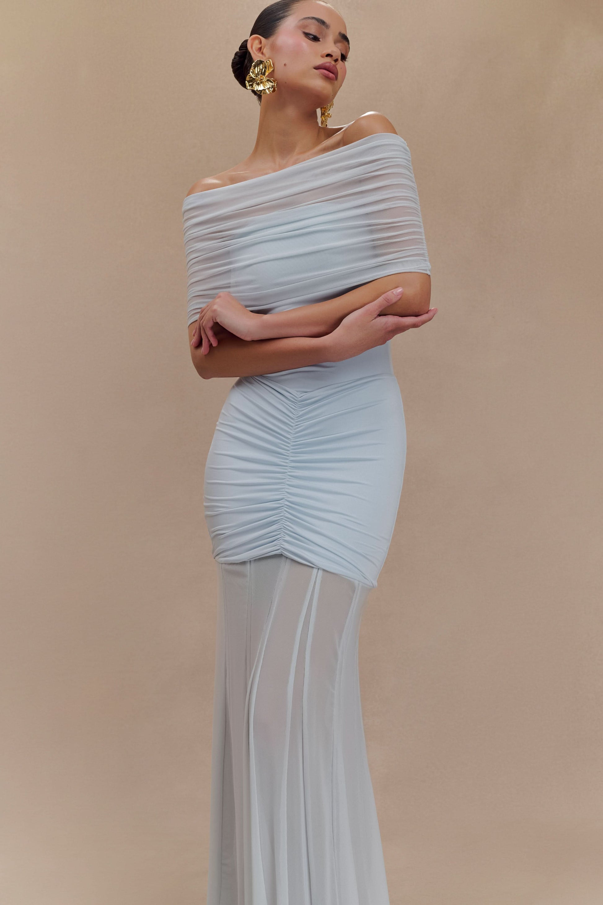 Light blue off-shoulder maxi dress with draped neckline and ruched waist detail