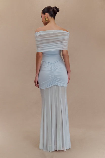 Light blue off-shoulder maxi dress back view showing ruched fabric and flowing train