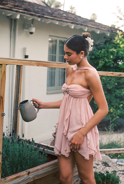 Pink halter mini dress with ruched sweetheart bodice and layered skirt