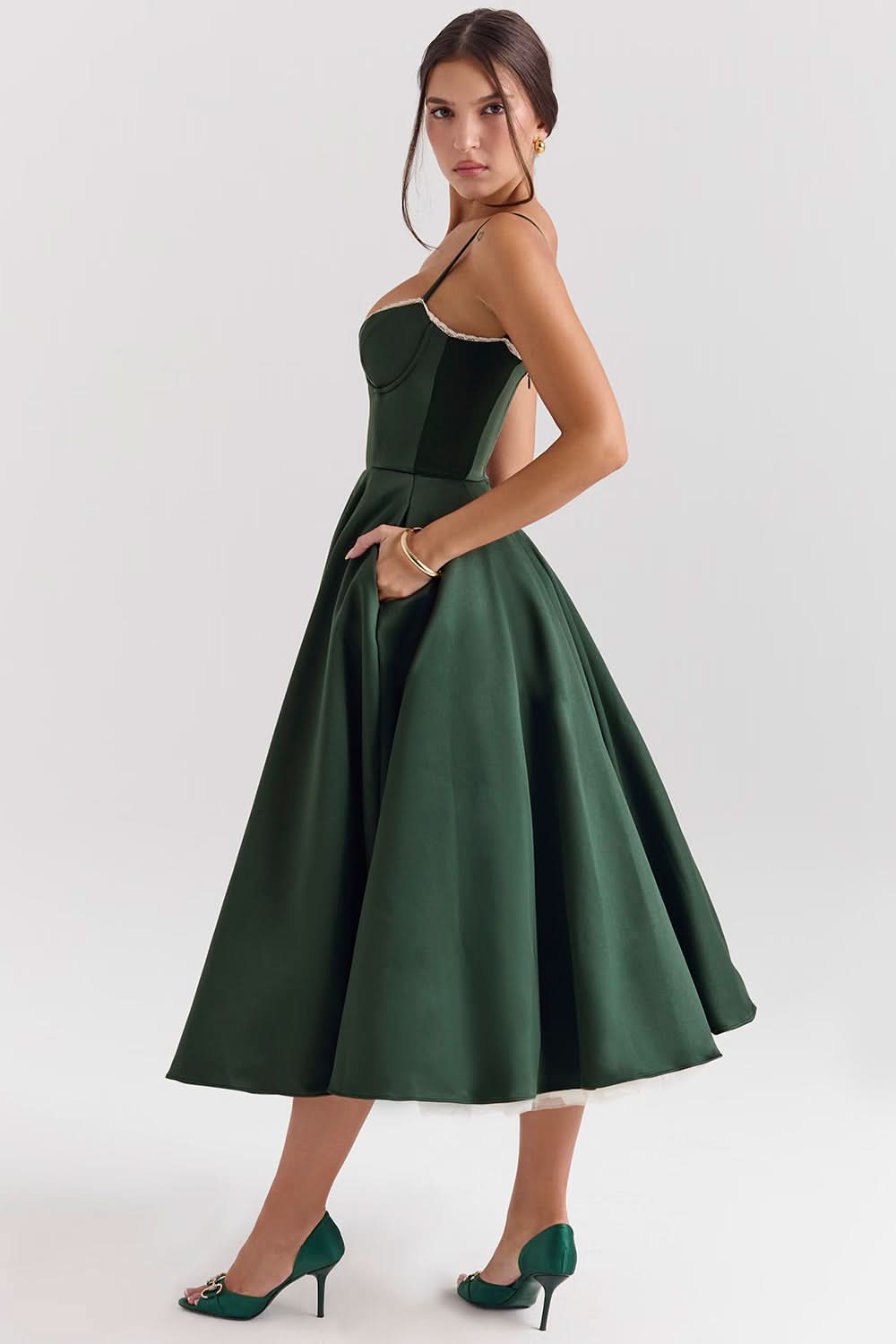 Back view of forest green midi dress with open back detail