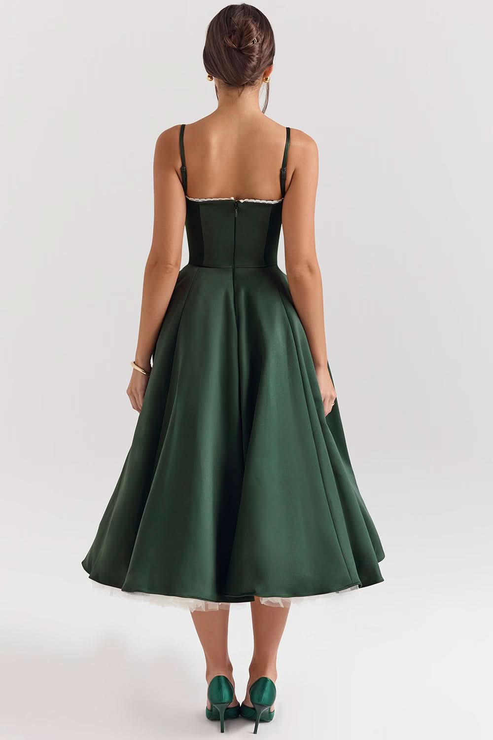 Rear view of forest green sweetheart midi dress with structured bodice
