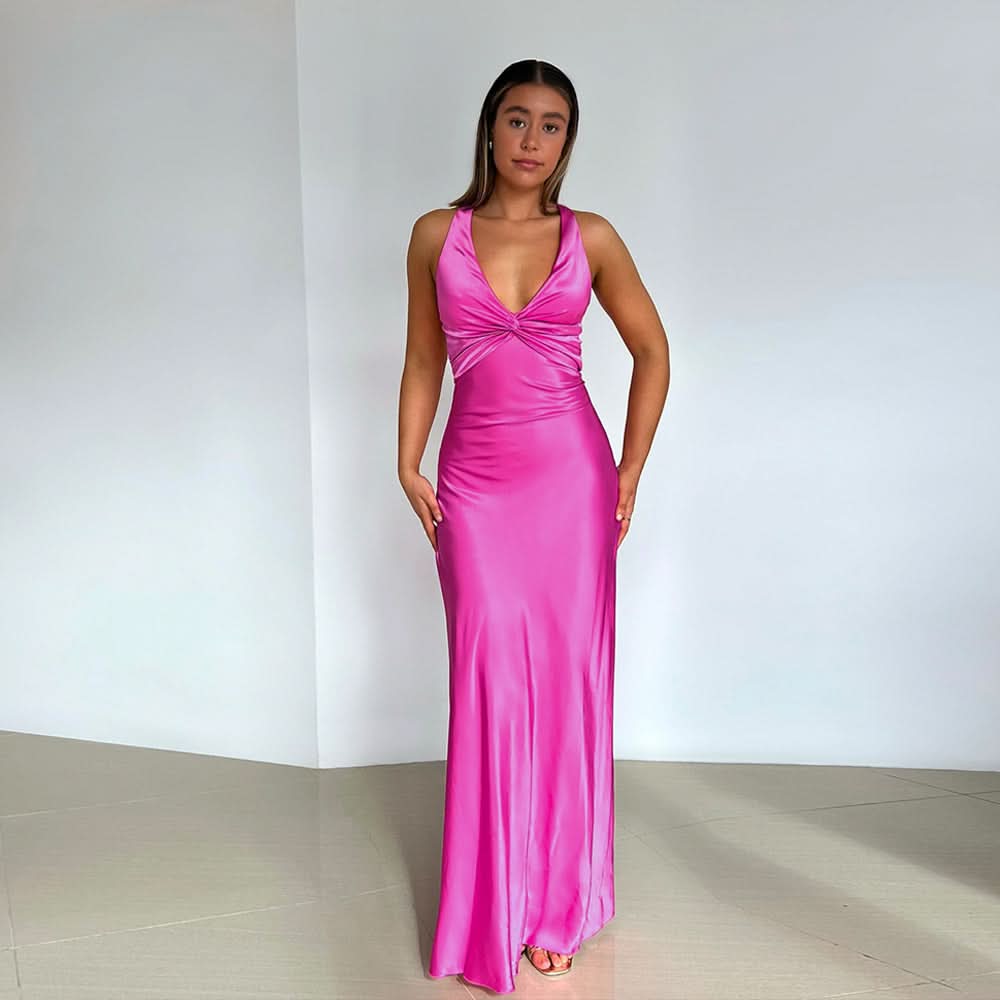 pink sleeveless maxi dress with twisted front neckline and fitted silhouette