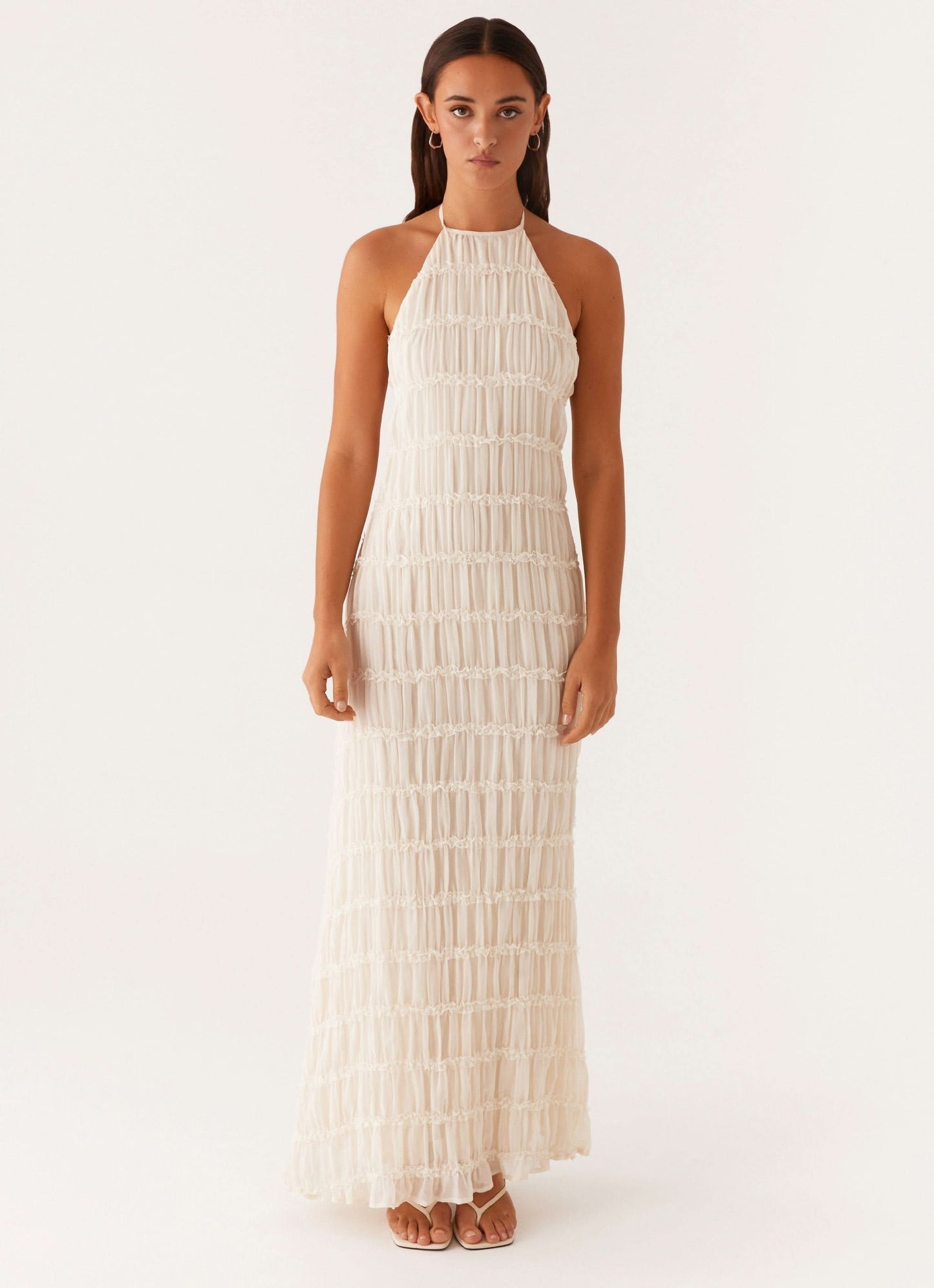 Cream pleated halter maxi dress with horizontal stripe pattern throughout