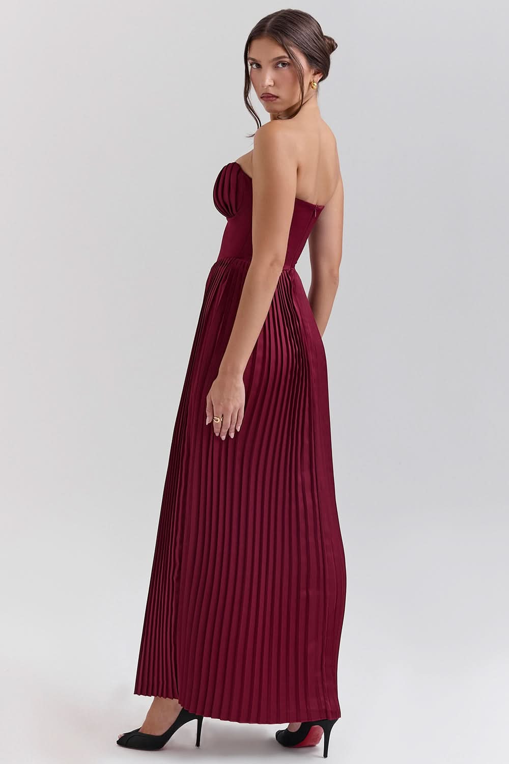 Back view of burgundy maxi dress with sweetheart neckline and pleated skirt