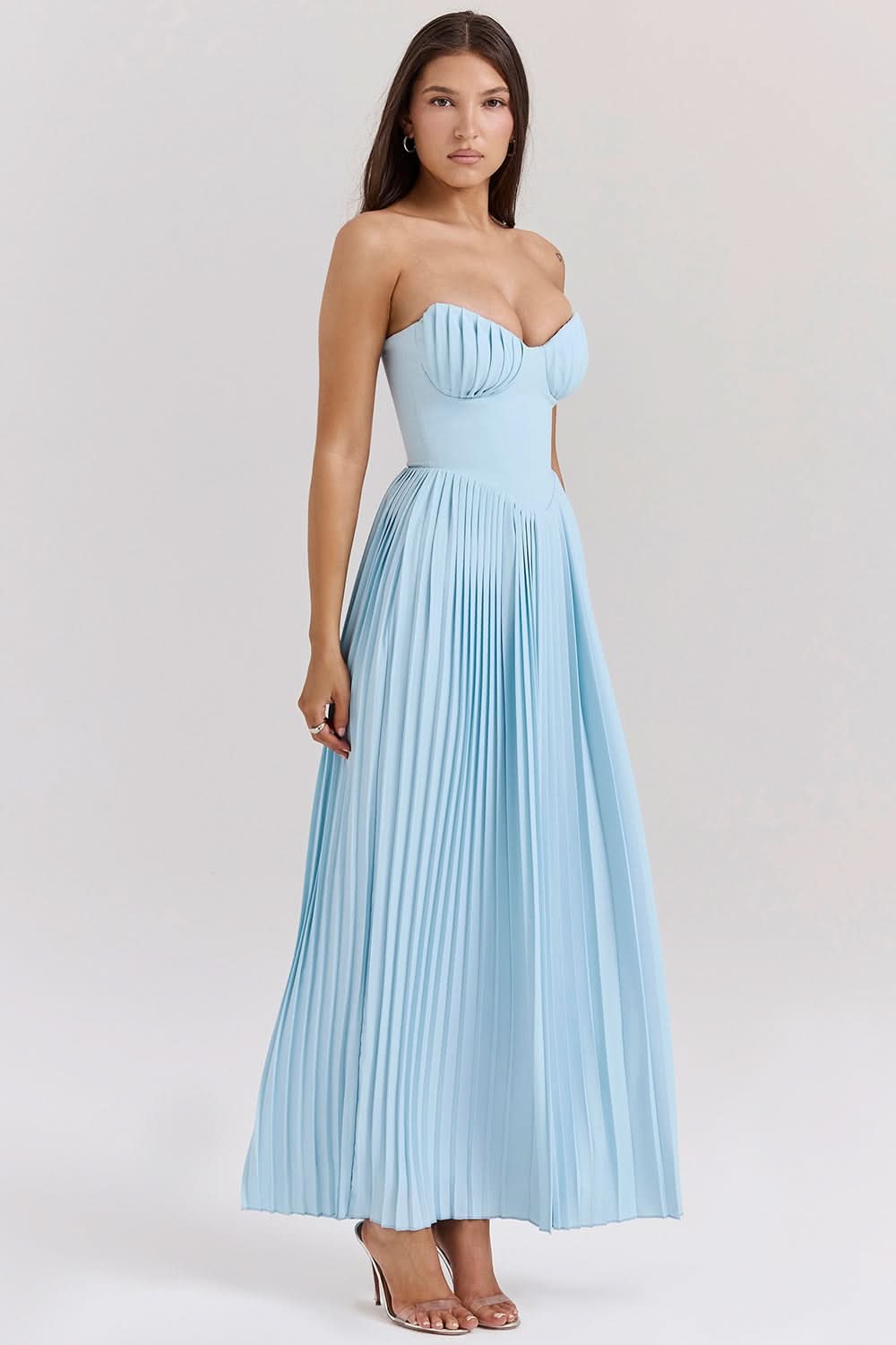 Strapless light blue evening dress with ruched bust and pleated skirt