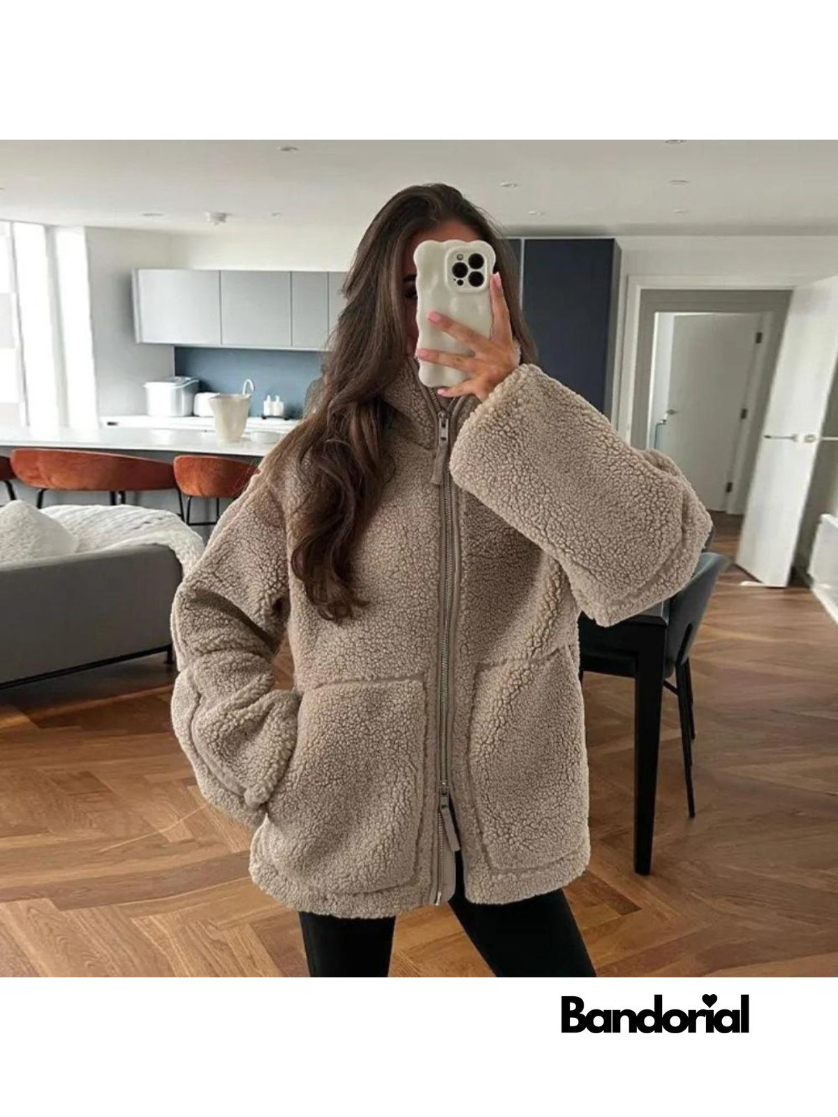 Model in cream sherpa jacket showing relaxed oversized fit and patch pockets