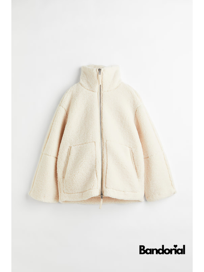 Cream sherpa teddy jacket with stand collar and zip front flat lay