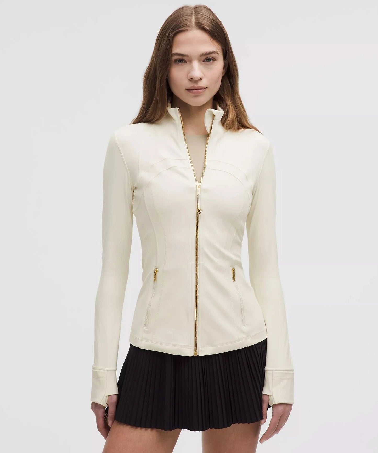 Cream white define jacket with gold hardware and fitted waist