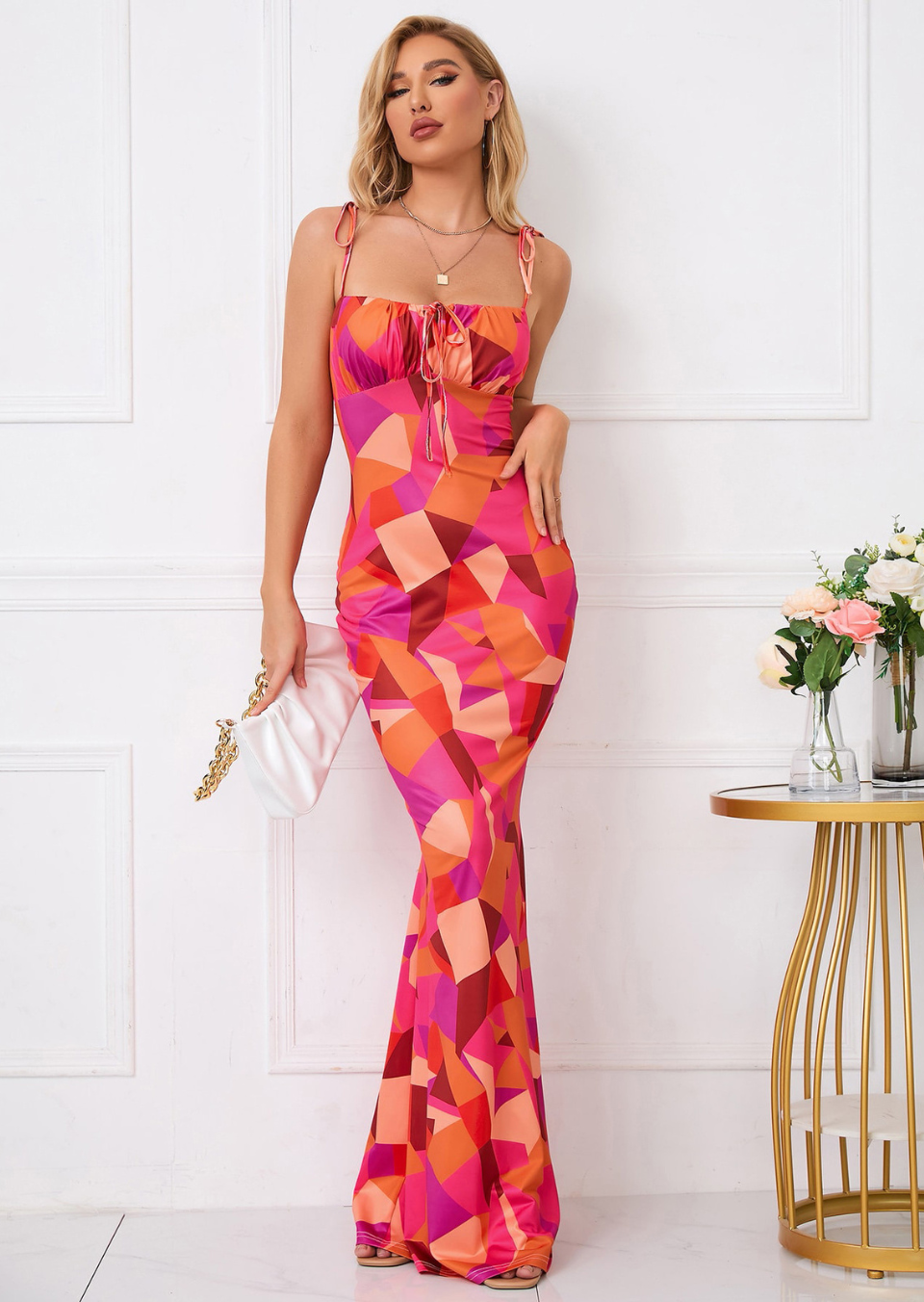Colorful geometric maxi dress in magenta, orange and pink with tie-front neckline