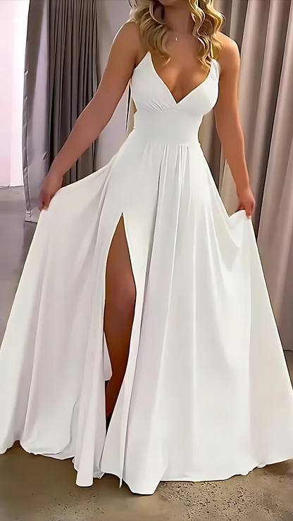 Ivory white sleeveless maxi dress with V-neckline and high leg slit detail