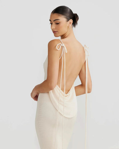 Women's cream backless maxi dress with dramatic cowl back and adjustable tie straps