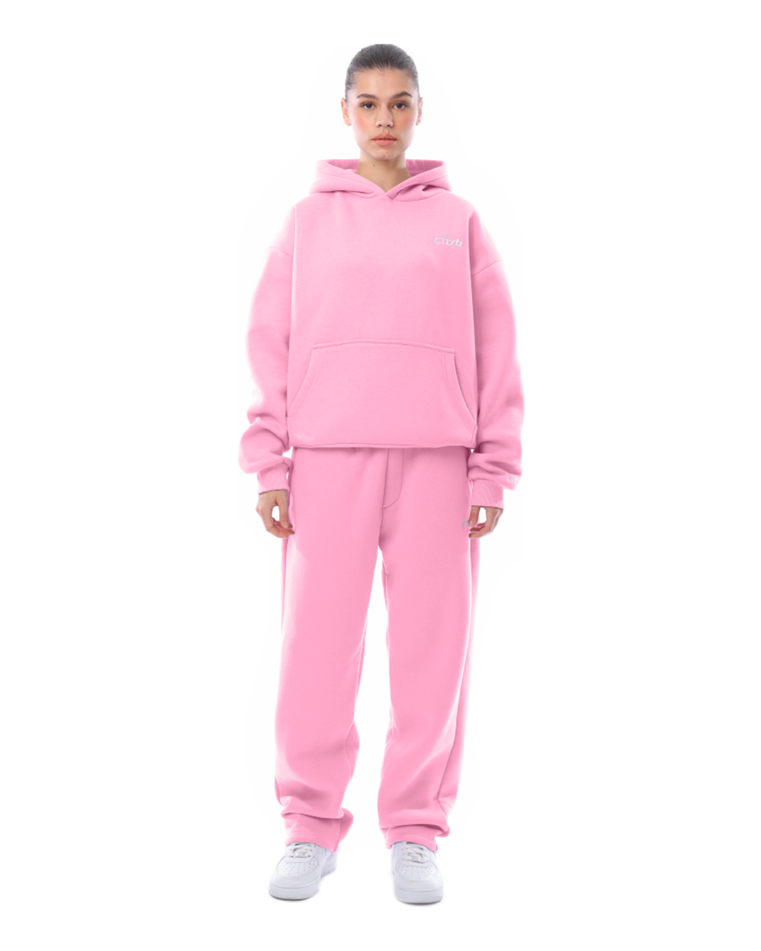 Pink unisex hoodie with kangaroo pocket and matching joggers front view