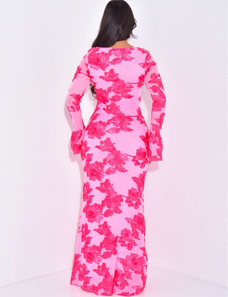 Back view of pink sequin floral maxi dress with bell sleeves