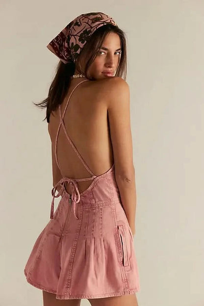 Mauve denim romper with open back tie closure, rear view