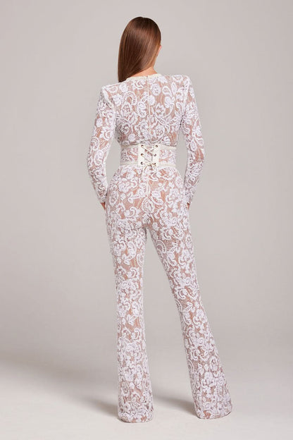 Back view of white lace jumpsuit with lace-up waist detail