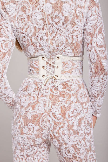 Full-length white lace jumpsuit with flared legs and waist belt