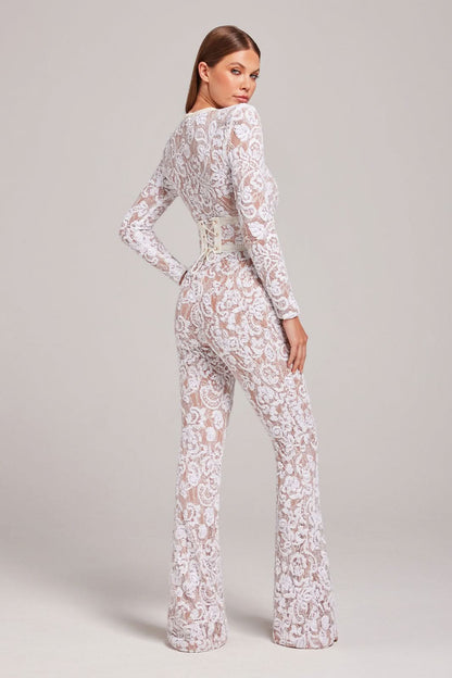 Back view of white lace jumpsuit with cream lace-up belt
