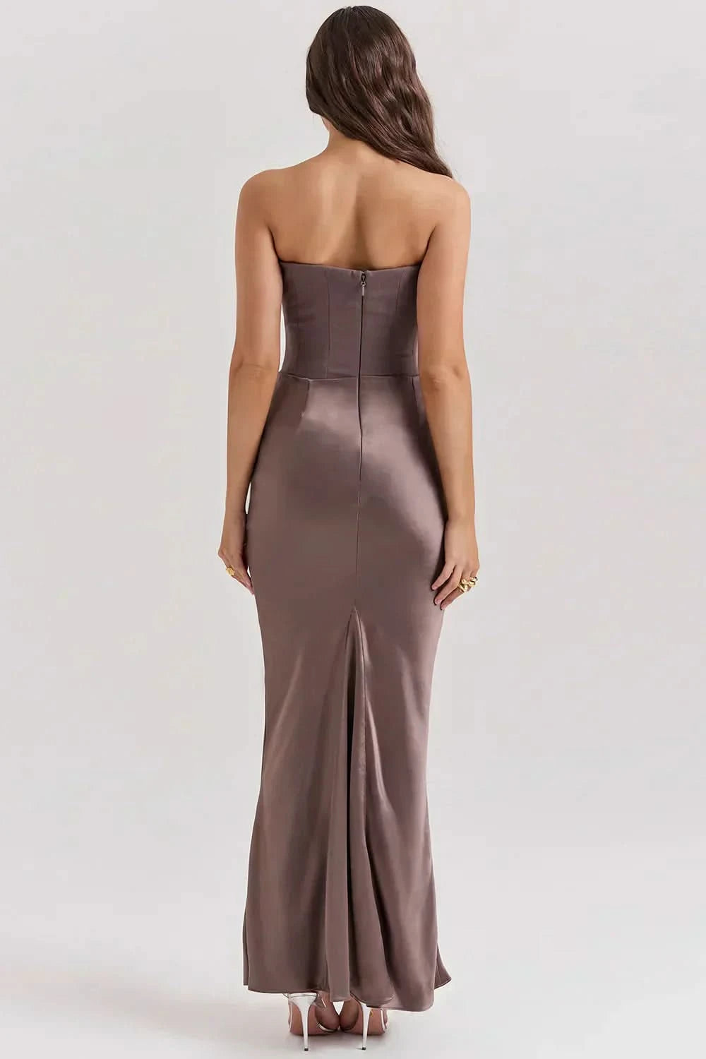 Taupe strapless corset maxi dress with structured bodice and slit back, rear view
