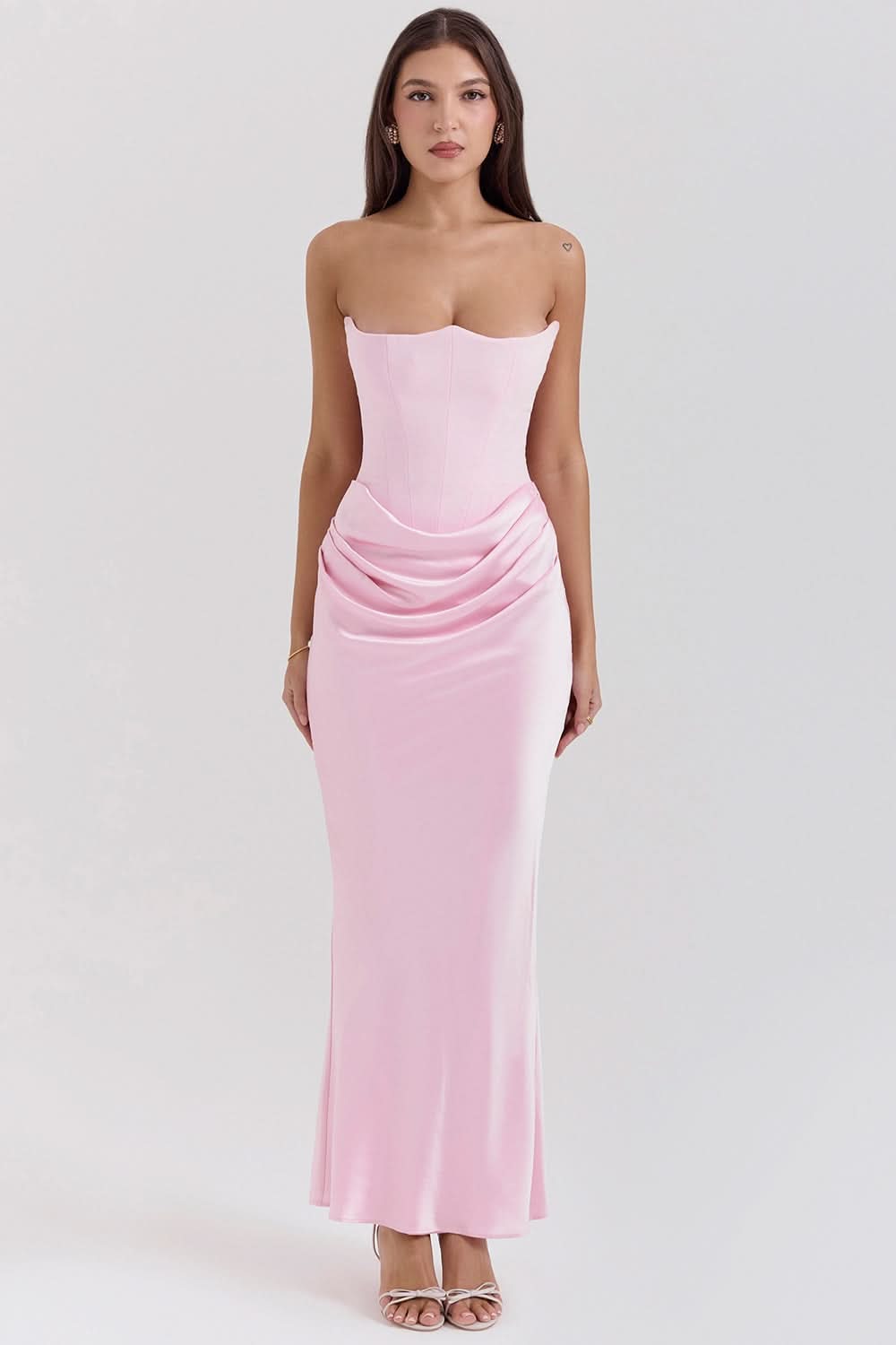 Pink strapless corset maxi dress with gathered waist and flowing skirt, front view