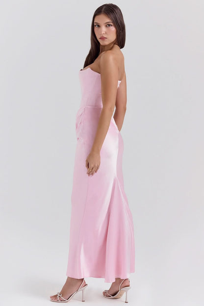 Pink strapless corset maxi dress with ruched detail and open back, side view
