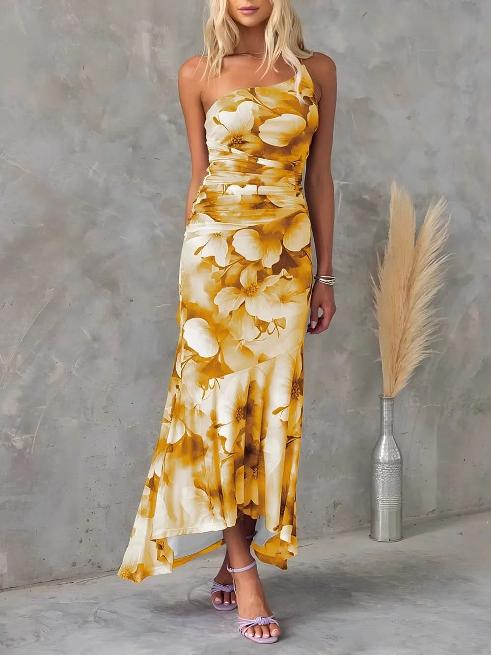 One-shoulder floral maxi dress in golden yellow with white petals