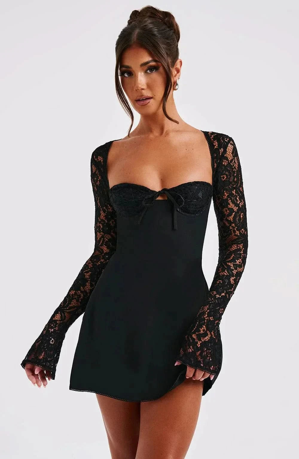 Black lace mini dress with sweetheart neckline and long lace sleeves