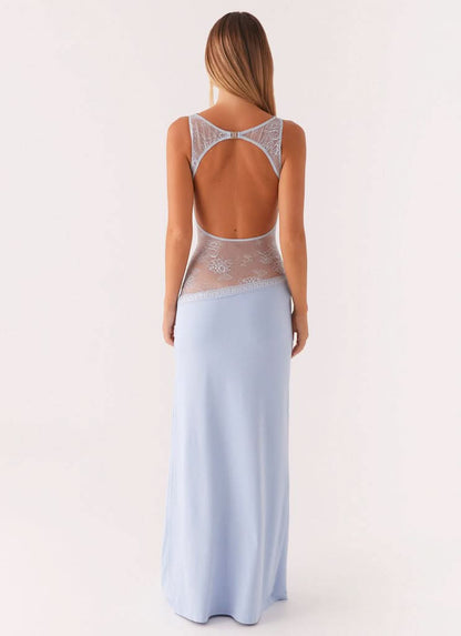 Light blue sleeveless maxi dress with lace waist panel and open back detail