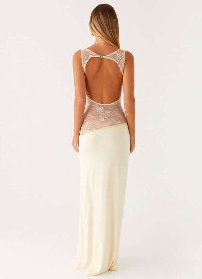 Cream sleeveless maxi dress with lace waist panel and open back cutout