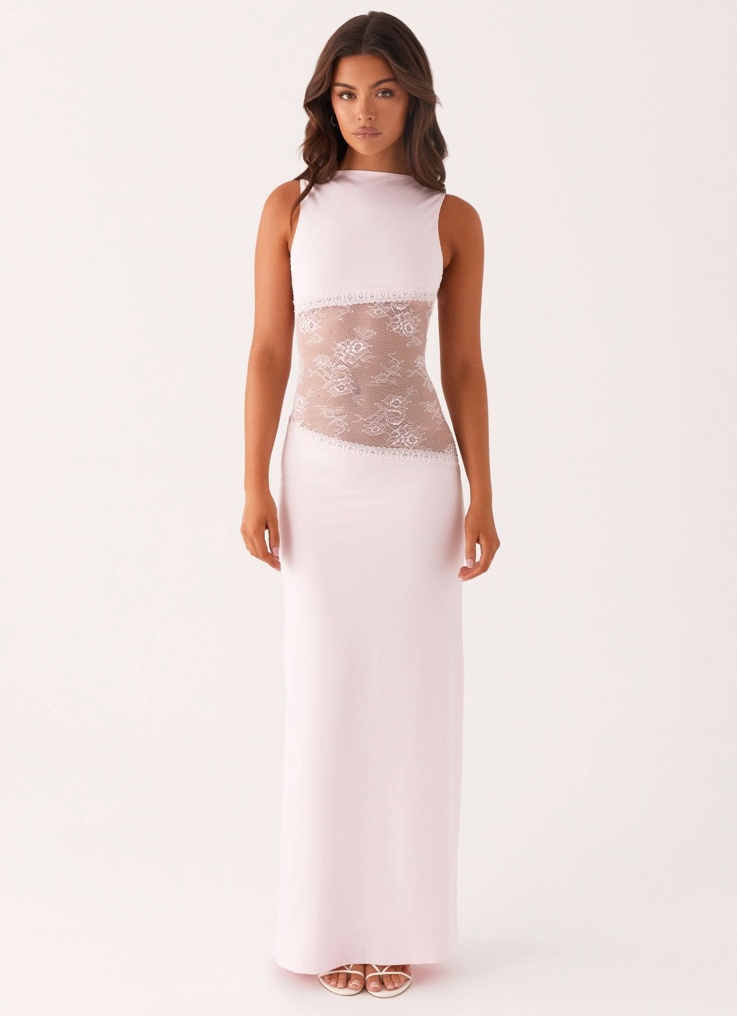 Pale pink sleeveless maxi dress with lace midsection and floor-length hem