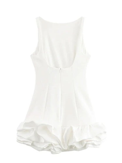 Side profile of white fitted mini dress with ruffled bubble skirt hem