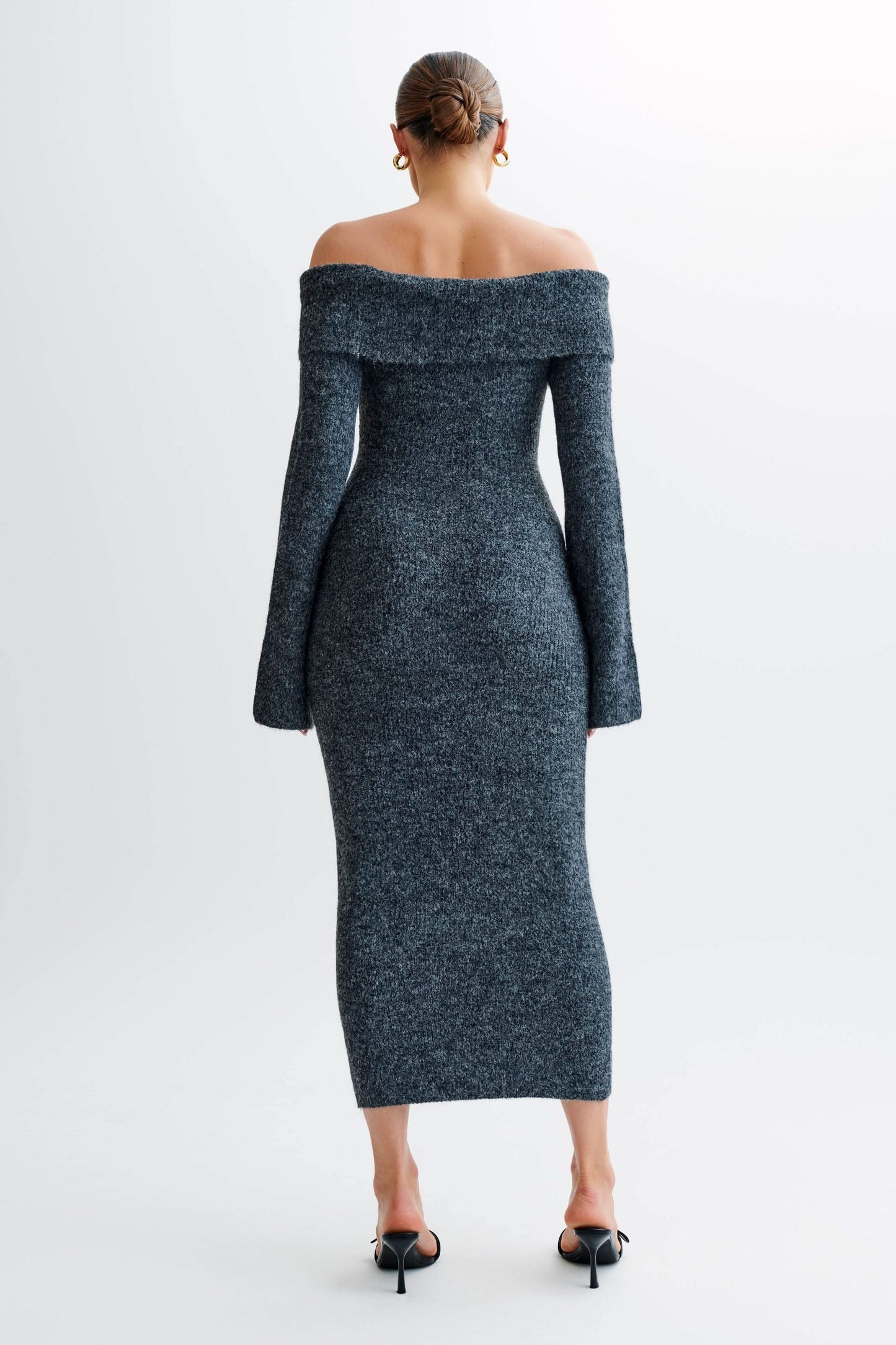 Back view of charcoal gray off-shoulder knit midi dress with bell sleeves