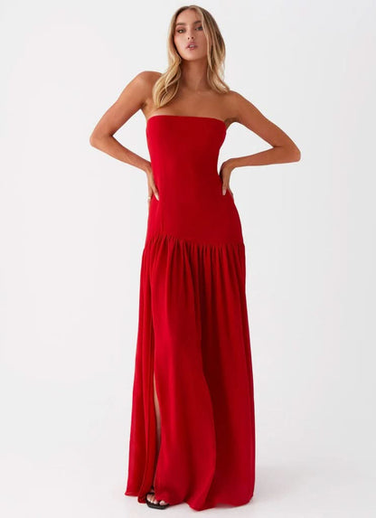 Red strapless evening maxi dress with pleated floor-length skirt