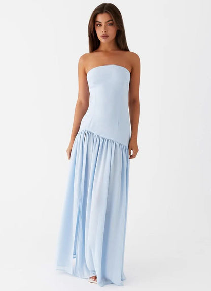 Light blue strapless maxi dress with pleated skirt and floor-length hem