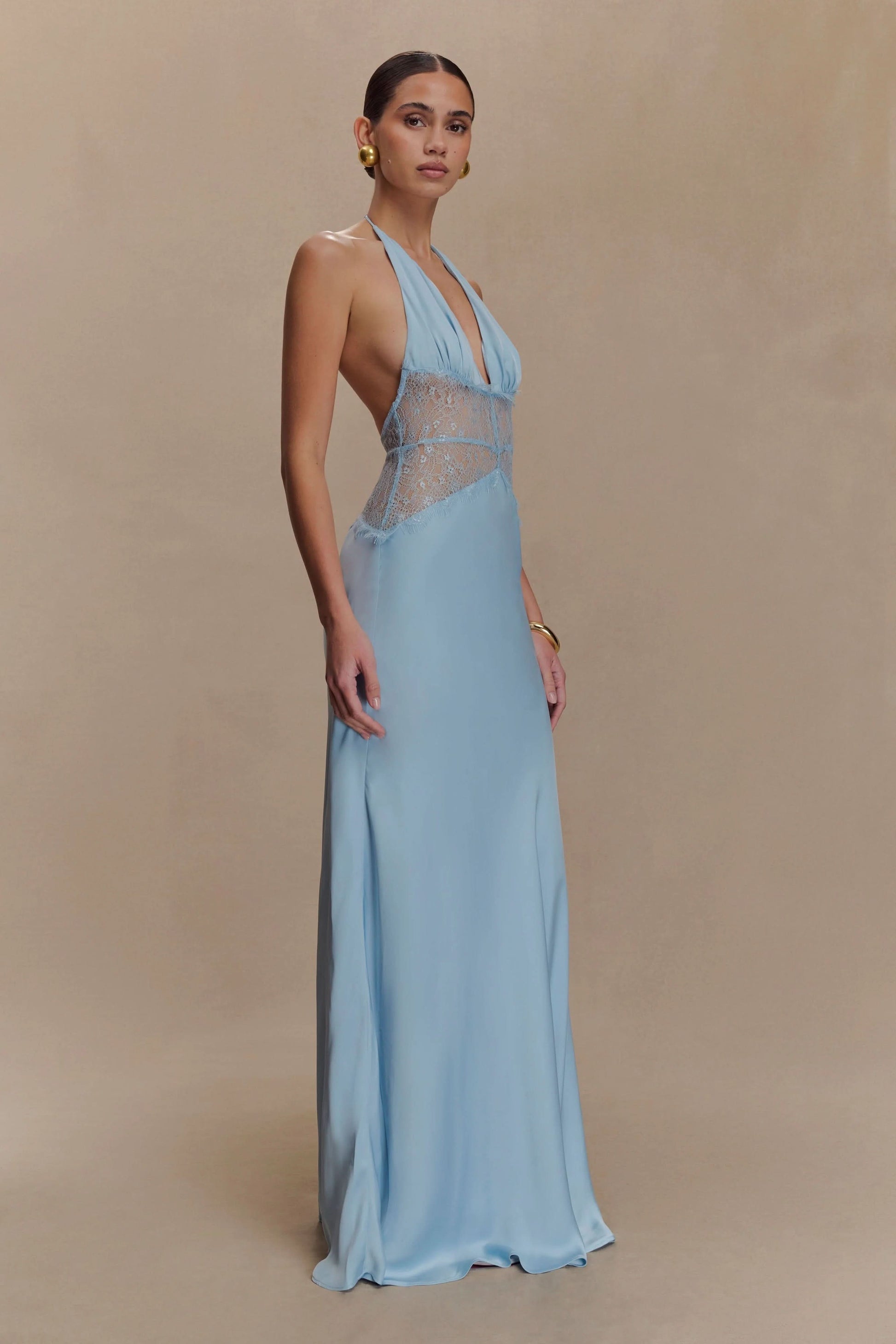 Side view of light blue maxi dress with lace bodice detail