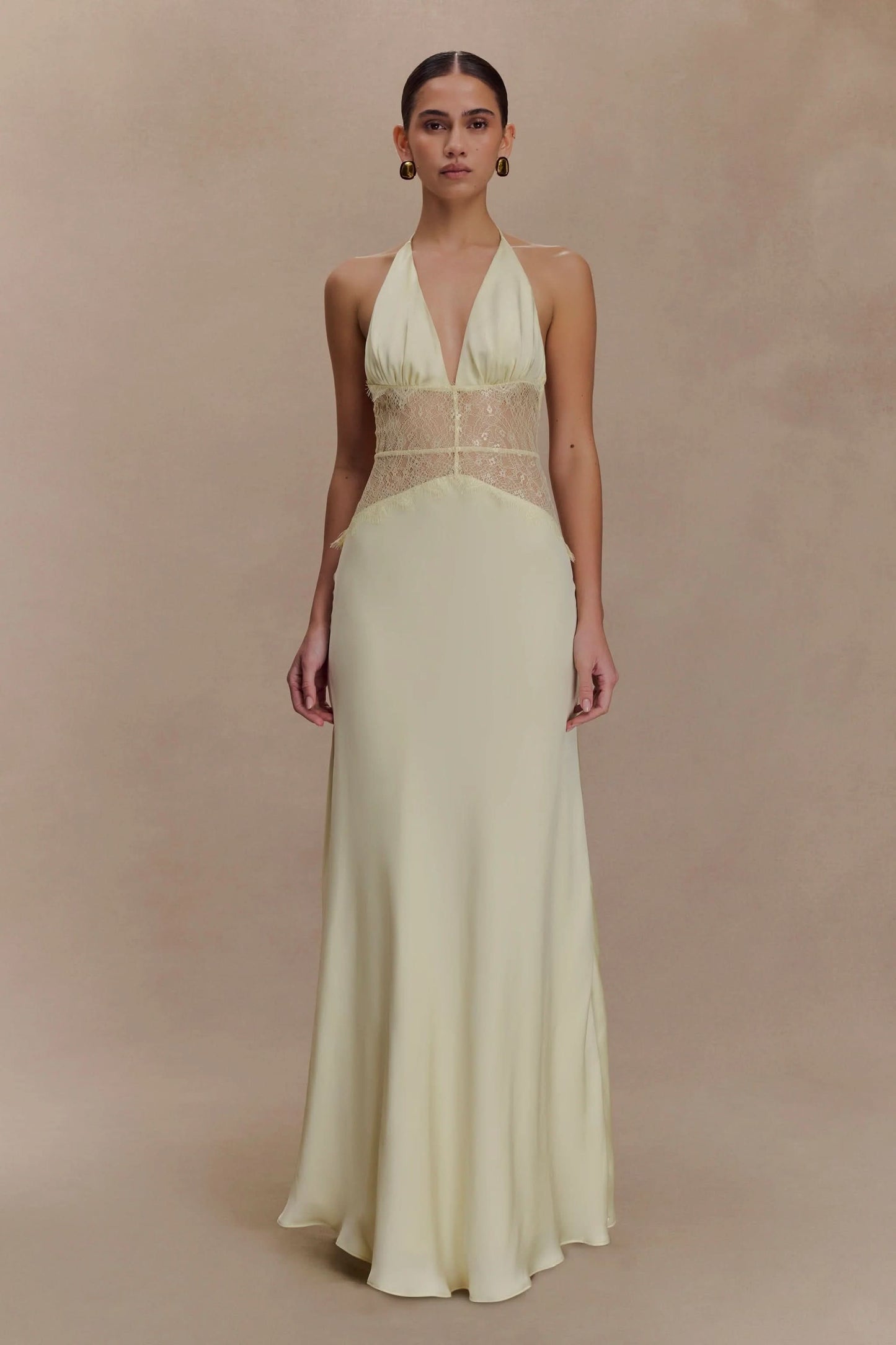 Cream halter maxi dress with beaded lace waist and flowing skirt