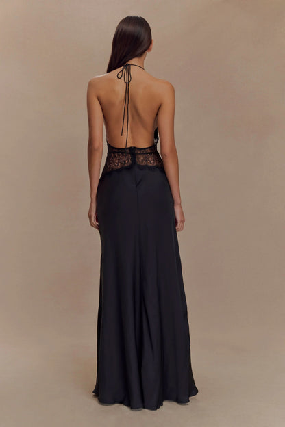Back view of black maxi dress with halter tie and lace waistband