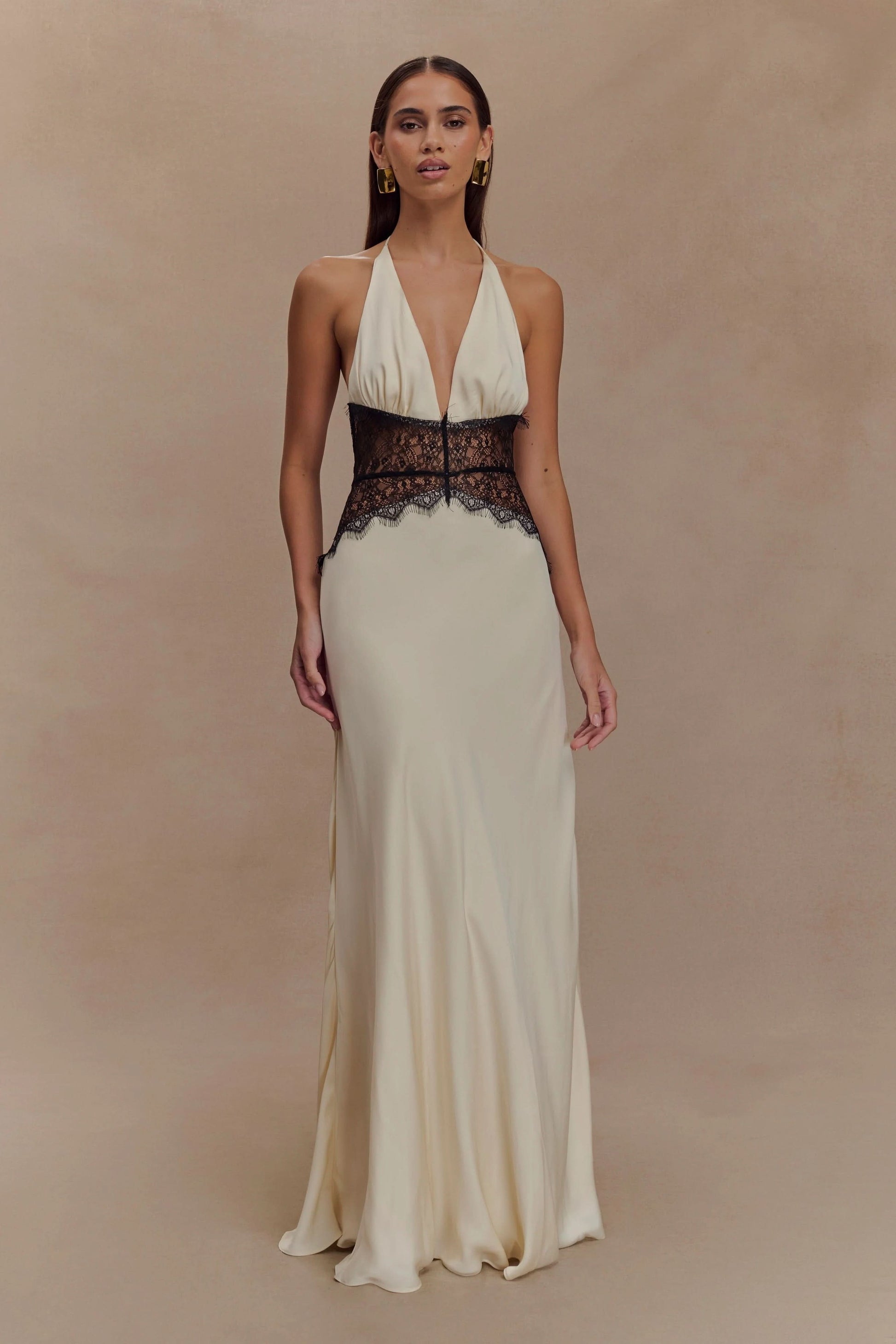 Cream halter maxi dress with black lace waist and fringe trim