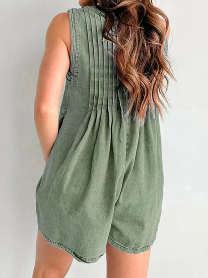 Sage green denim romper back view with vertical pleats and side pockets