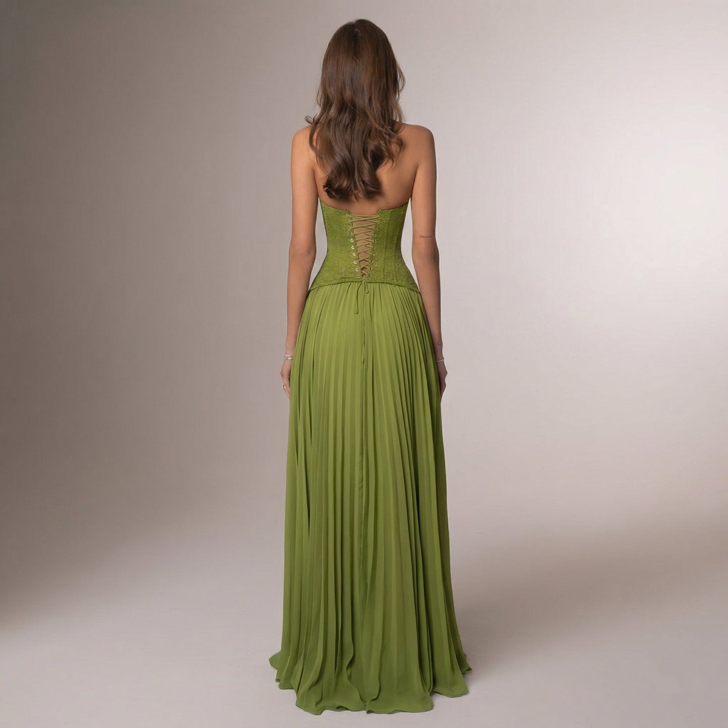 Back view of lime green halter maxi dress with lace-up corset closure detail for women